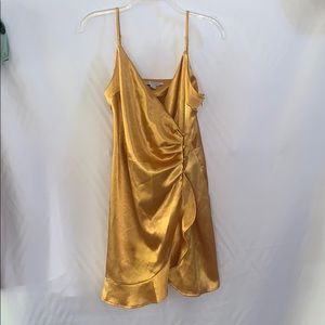 Gold wrap side button dress